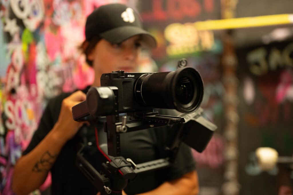 A person holding the Nikon ZR