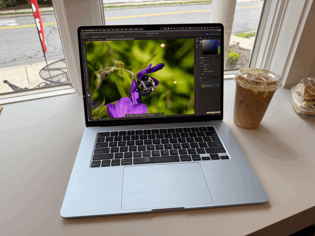 An 4 Macbook Air sitting on a table.